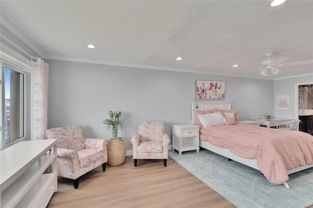 bedroom featuring crown molding, recessed lighting, light wood-style floors, and a ceiling fan