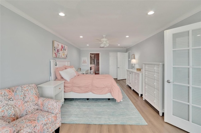 bedroom featuring light wood-type flooring, ornamental molding, and recessed lighting
