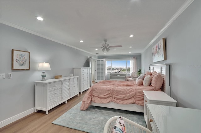 bedroom with light wood-style flooring, baseboards, ornamental molding, and recessed lighting