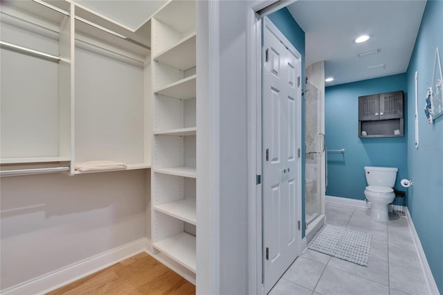 spacious closet featuring visible vents and tile patterned flooring
