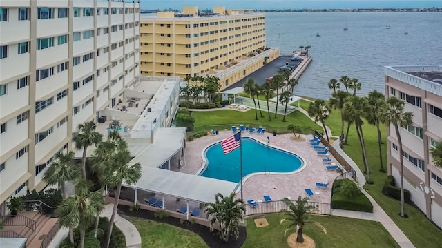 birds eye view of property featuring a water view