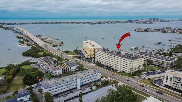 bird's eye view featuring a water view and a city view