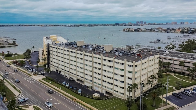 bird's eye view featuring a water view and a city view