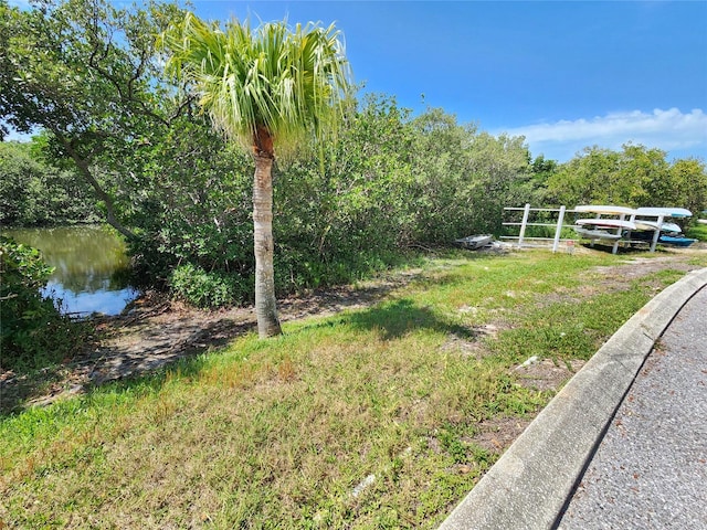 1500 Sunset Rd Unit C7, Tarpon Springs, FL 34689 - view of yard featuring a water view