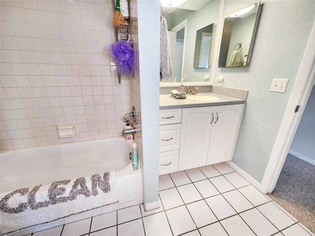 1500 Sunset Rd Unit C7, Tarpon Springs, FL 34689 - full bath with tile patterned floors, vanity, shower / tub combination, and baseboards