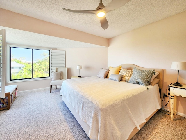 1500 Sunset Rd Unit C7, Tarpon Springs, FL 34689 - carpeted bedroom with baseboards, a textured ceiling, and a ceiling fan