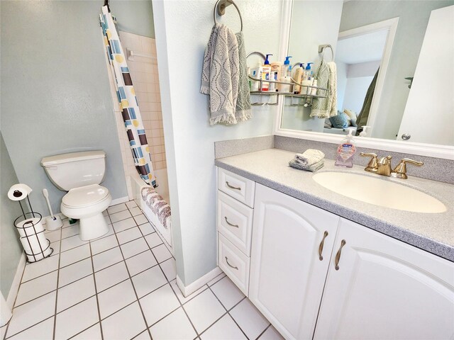 1500 Sunset Rd Unit C7, Tarpon Springs, FL 34689 - full bathroom with toilet, tile patterned flooring, vanity, and shower / bathtub combination with curtain