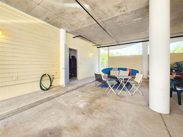 1500 Sunset Rd Unit C7, Tarpon Springs, FL 34689 - view of patio / terrace with outdoor dining area