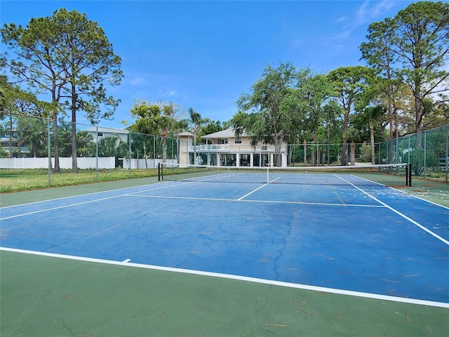 1500 Sunset Rd Unit C7, Tarpon Springs, FL 34689 - view of tennis court featuring community basketball court
