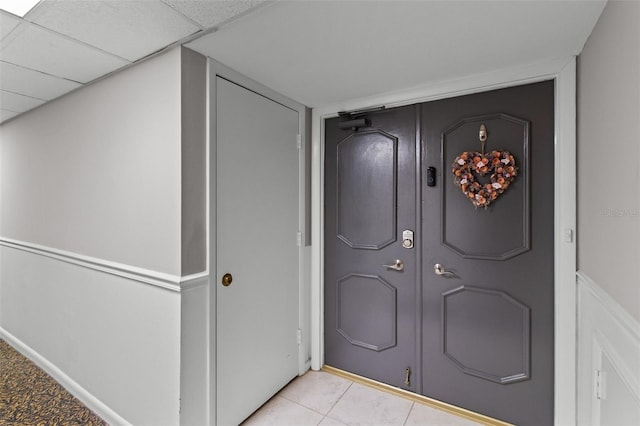 220 Belleview Blvd Unit 104, Belleair, FL 33756 - foyer with light tile patterned floors