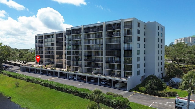 220 Belleview Blvd Unit 104, Belleair, FL 33756 - view of apartment building / complex