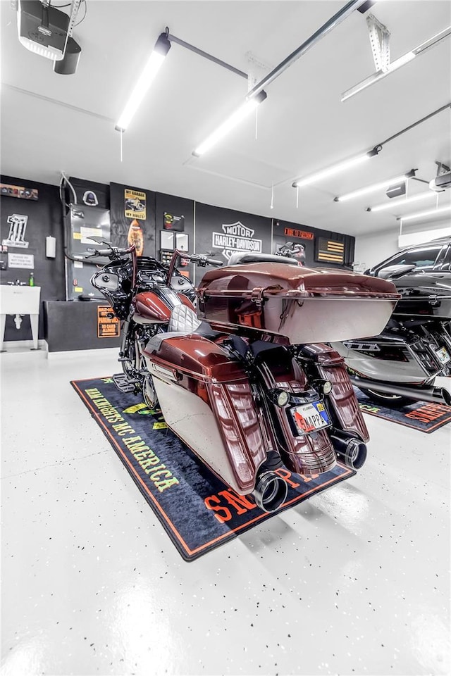 garage featuring a garage door opener