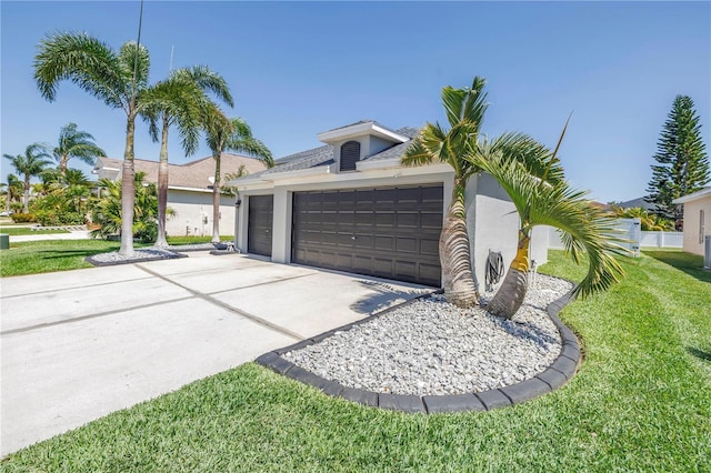 garage featuring driveway