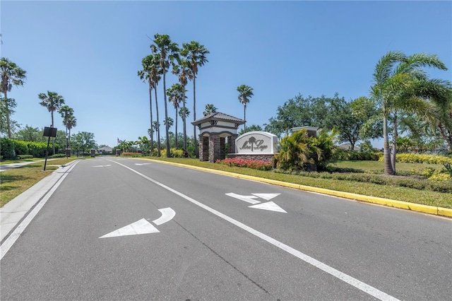 view of road featuring curbs