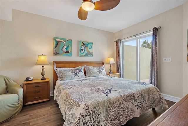 11605 Gulf Blvd Unit 203, Treasure Island, FL 33706 - bedroom featuring access to exterior, dark wood-type flooring, baseboards, and a ceiling fan