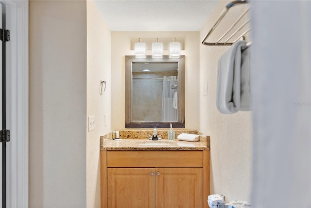 11605 Gulf Blvd Unit 203, Treasure Island, FL 33706 - bathroom featuring vanity and a shower