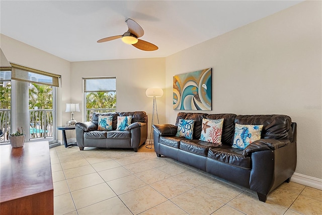 11605 Gulf Blvd Unit 203, Treasure Island, FL 33706 - living area featuring a ceiling fan and light tile patterned floors
