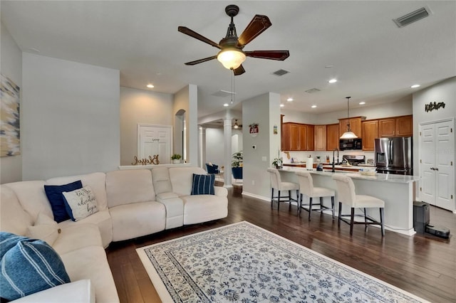 20537 Lace Cascade Rd, Land O Lakes, FL 34637 - living area with dark wood-style flooring, a ceiling fan, baseboards, and recessed lighting