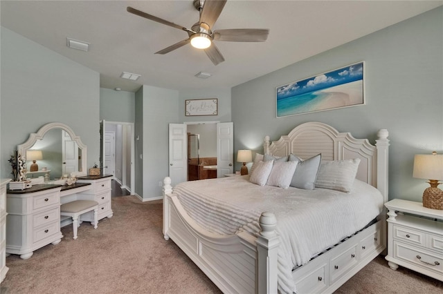 20537 Lace Cascade Rd, Land O Lakes, FL 34637 - bedroom featuring light colored carpet, connected bathroom, ceiling fan, and baseboards