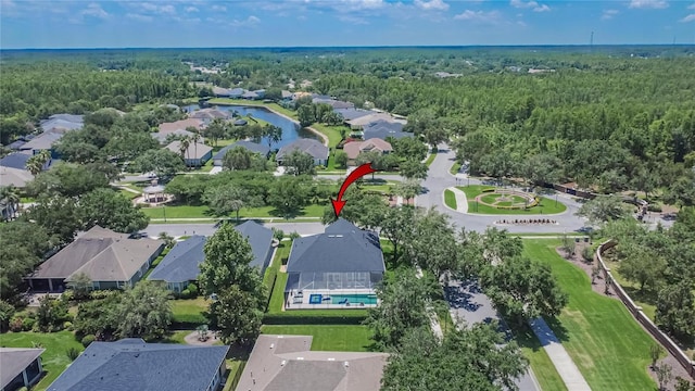 20537 Lace Cascade Rd, Land O Lakes, FL 34637 - aerial perspective of suburban area with a heavily wooded area and a pool area