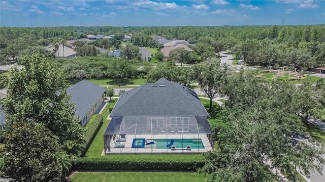 20537 Lace Cascade Rd, Land O Lakes, FL 34637 - aerial perspective of suburban area with a heavily wooded area