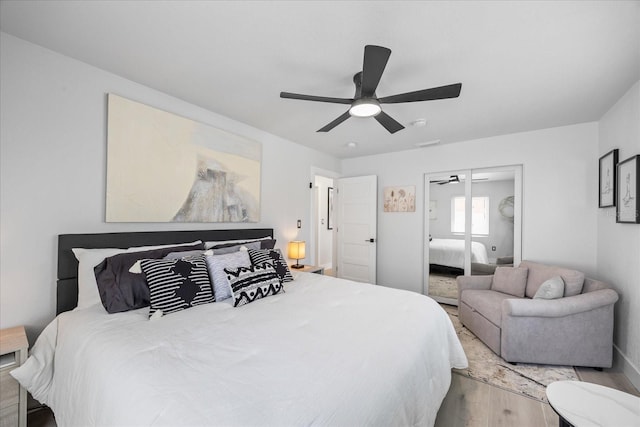 7889 3rd Ave S, Saint Petersburg, FL 33707 - bedroom featuring light wood-type flooring and a ceiling fan