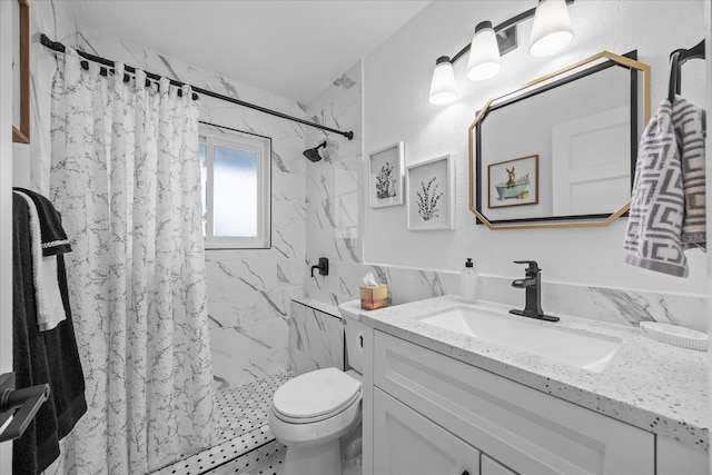 7889 3rd Ave S, Saint Petersburg, FL 33707 - bathroom with vanity, toilet, and a marble finish shower