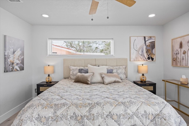 7889 3rd Ave S, Saint Petersburg, FL 33707 - bedroom with baseboards, wood finished floors, recessed lighting, and ceiling fan