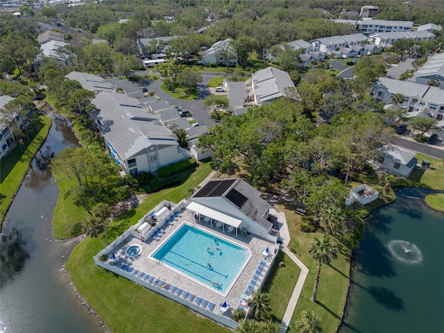 bird's eye view with a residential view and a water view