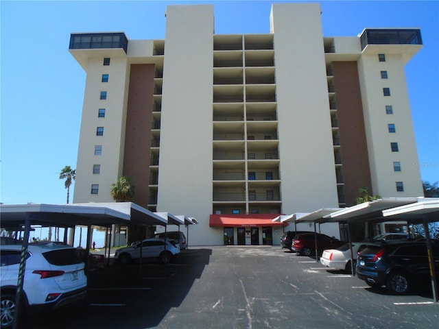 view of property with covered parking