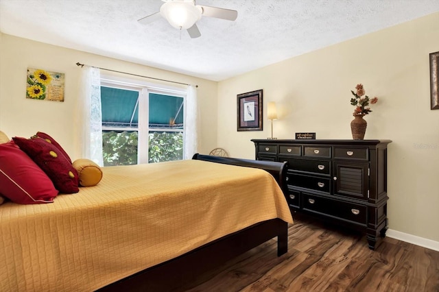 13902 Bardmoor Pl Unit B, Tampa, FL 33618 - bedroom with dark wood finished floors, a textured ceiling, baseboards, and a ceiling fan
