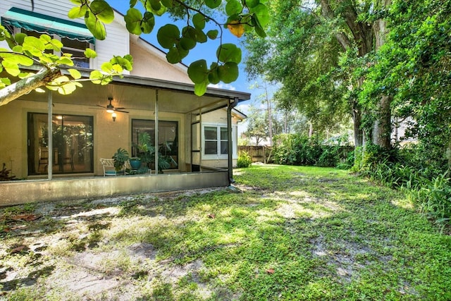 13902 Bardmoor Pl Unit B, Tampa, FL 33618 - back of house featuring a ceiling fan