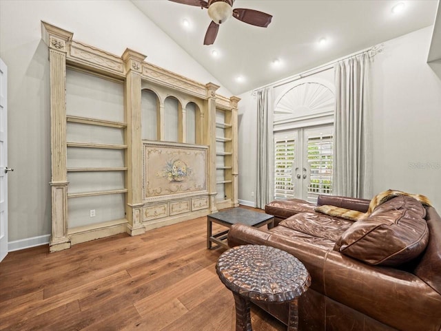 living area with recessed lighting, wood finished floors, a ceiling fan, french doors, and lofted ceiling