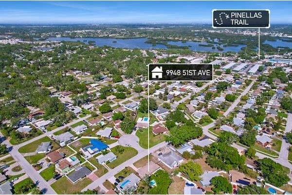 aerial view with a water view and a residential view