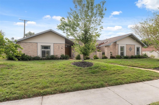 2906 Beagle Pl, Seffner, FL 33584 - single story home with a front yard and brick siding