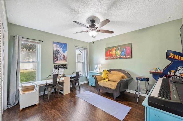 2906 Beagle Pl, Seffner, FL 33584 - office with a textured ceiling, ceiling fan, baseboards, and dark wood-style floors