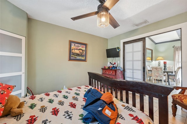 2906 Beagle Pl, Seffner, FL 33584 - bedroom featuring tile patterned floors, a ceiling fan, and visible vents