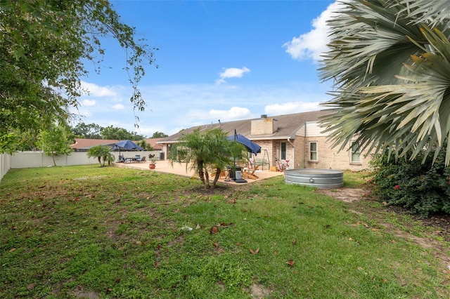2906 Beagle Pl, Seffner, FL 33584 - view of yard featuring a patio and a fenced backyard