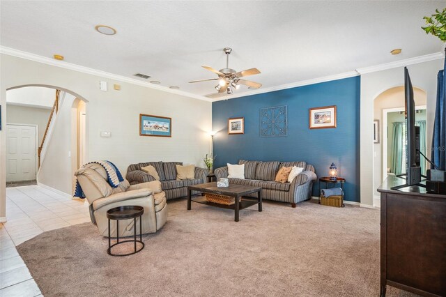 11519 Cypress Reserve Dr, Tampa, FL 33626 - living room with crown molding, visible vents, a ceiling fan, and arched walkways