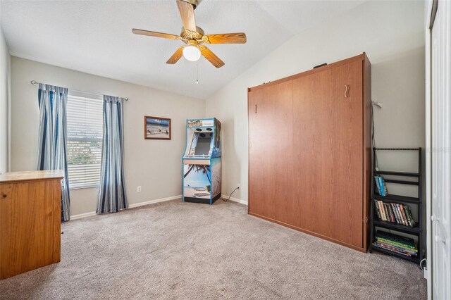 11519 Cypress Reserve Dr, Tampa, FL 33626 - unfurnished bedroom featuring baseboards, ceiling fan, carpet, and vaulted ceiling