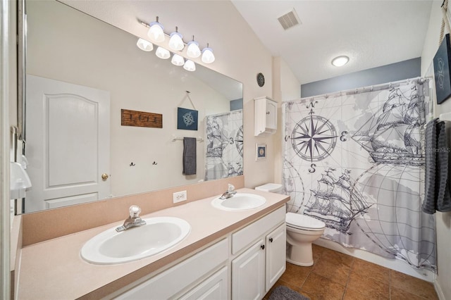 11519 Cypress Reserve Dr, Tampa, FL 33626 - bathroom featuring double vanity, visible vents, a sink, and toilet
