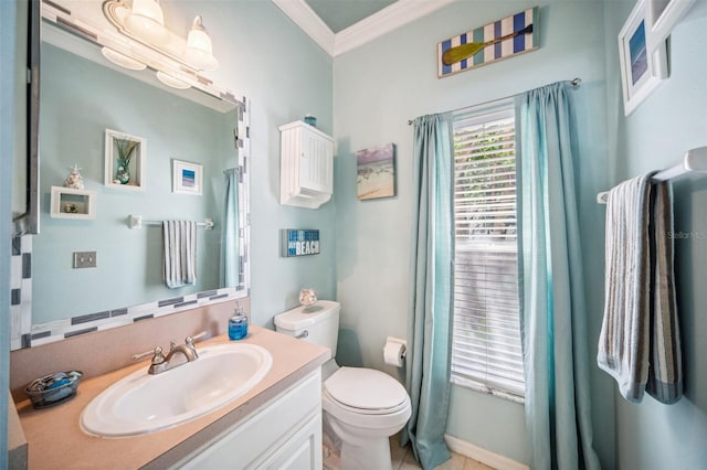 11519 Cypress Reserve Dr, Tampa, FL 33626 - bathroom featuring toilet, vanity, and ornamental molding
