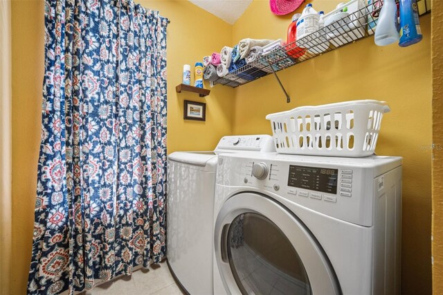 11519 Cypress Reserve Dr, Tampa, FL 33626 - laundry area with independent washer and dryer, laundry area, and tile patterned flooring