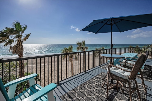 1600 Gulf Blvd Unit 212, Clearwater Beach, FL 33767 - balcony featuring a beach view, a water view, and a sunroom