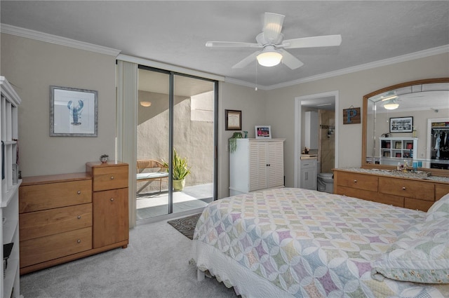 1600 Gulf Blvd Unit 212, Clearwater Beach, FL 33767 - carpeted bedroom featuring a wall of windows, ceiling fan, access to exterior, ornamental molding, and ensuite bath