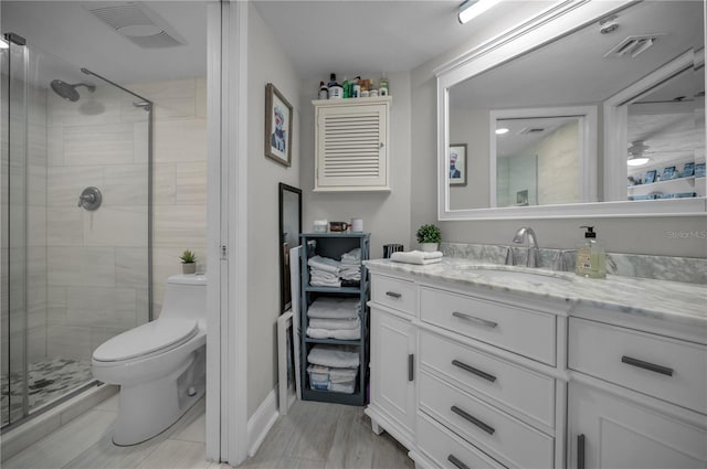 1600 Gulf Blvd Unit 212, Clearwater Beach, FL 33767 - full bathroom with vanity, toilet, visible vents, and a stall shower