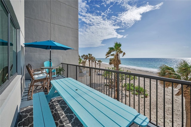 1600 Gulf Blvd Unit 212, Clearwater Beach, FL 33767 - balcony featuring a water view, a view of the beach, and outdoor dining space