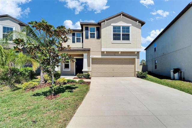 view of front facade featuring driveway, stucco siding, a front lawn, and a garage