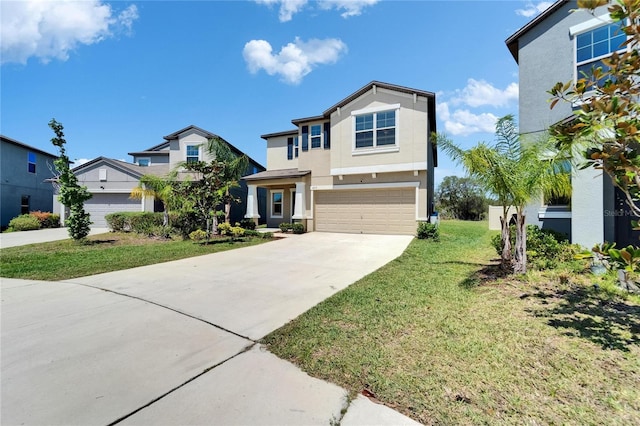 view of front of property with a front yard, driveway, a garage, and stucco siding