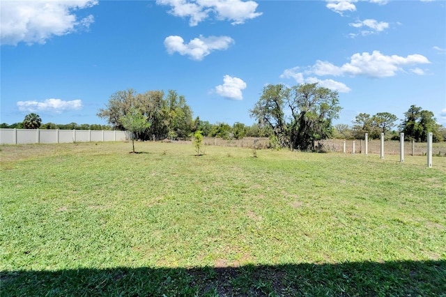 view of yard with fence